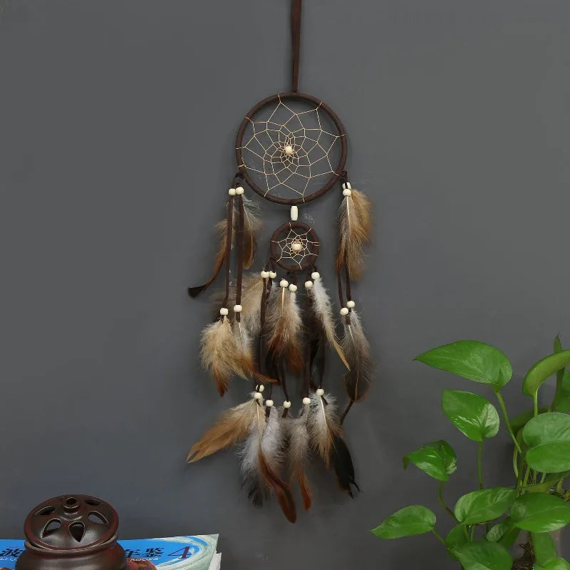 attrape rêves traditionnel plumes marron toile filet décoration chambre artisanal