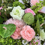 décoration mariage événement rose vert fleurs naturelles romantiqueextérieur table centre