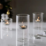 bougeoir transparent moderne bougie parfumée pied central rose minimaliste