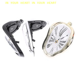 horloges surréalistes déformées noir doré argenté cadran transparent chiffres romains salon déco moderne
