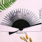 éventail pliant traditionnel bambou motif fleurs cerisier pompon mariage élégant