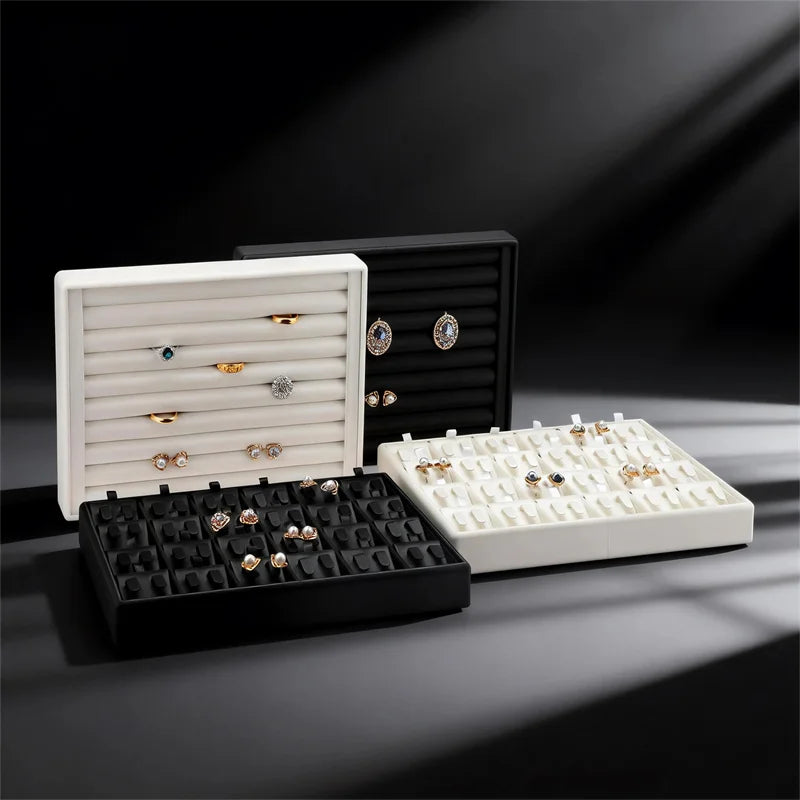 boîte bijoux cuir noir blanc plateau rangement bague boucle d'oreille organisation modernescrição