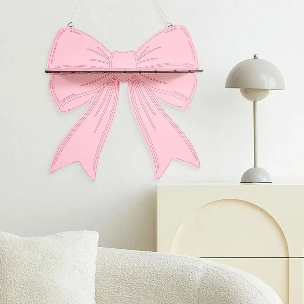 étagère murale bois rose clair motif ruban moderne clips métalliques