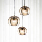 suspension lumineuse moderne transparent doré rayures verticales câble noir ampoules