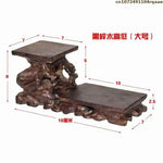 support table bois sculpté artisanal marron foncé miniatures collections décoration