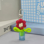 porte clés fleur tridimensionnelle couleurs vives boucle métallique créatif artisanal transparent opaque
