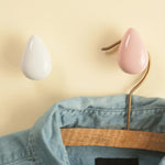 pinces linge modernes formes gouttes couleurs blanches grises roses jaunes bleues brillantes