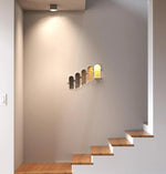 Applique murale escalier LED encastrée design Athènes allumée dans un couloir