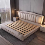 lit double simili cuir moderne beige gris pieds dorés tiroirs intégrés structure bois