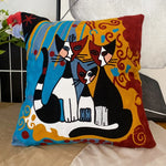 housse coussin coton brodé motifs abstraits visages stylisés moderne pop art bleu blanc orange