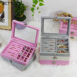 boîte bijoux velours transparent gris rose classique boutons pression rangement colliers bagues