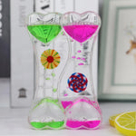 minuteur sablier liquide bicolore transparent motifs géométriques souriant deco moderne