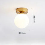 lampe moderne verre transparent noir doré élégante sphérique éclairage contemporain