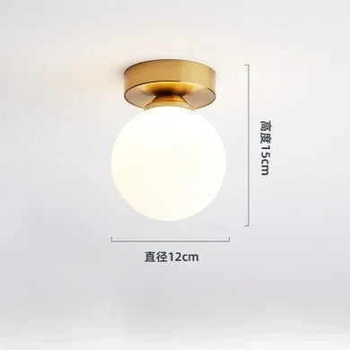 lampe moderne verre transparent noir doré élégante sphérique éclairage contemporain