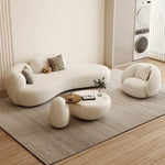 canapé lit blanc bouclé moderne table basse coussins décoratifs