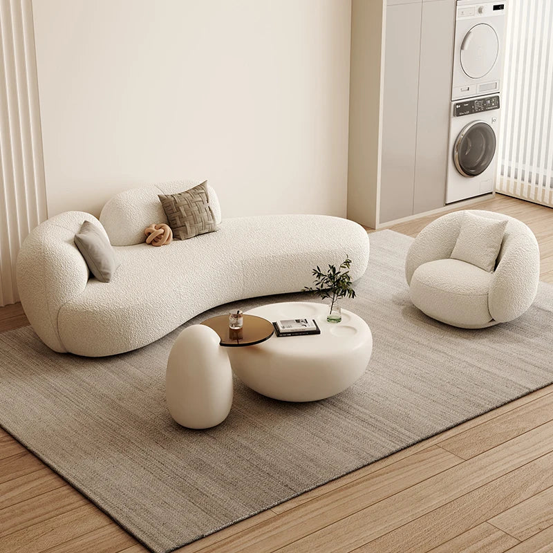 canapé lit blanc bouclé moderne table basse coussins décoratifs