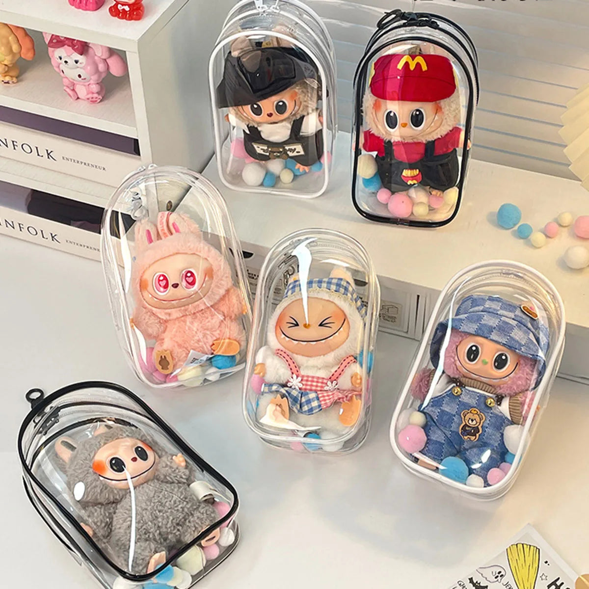 sac main transparent moderne chaîne métallique personnage peluche pompons colorés tendance adulte fille garçon