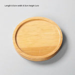 assiettes support plats bambou moderne minimaliste naturel bois clair grain bois respectueux environnement stockage