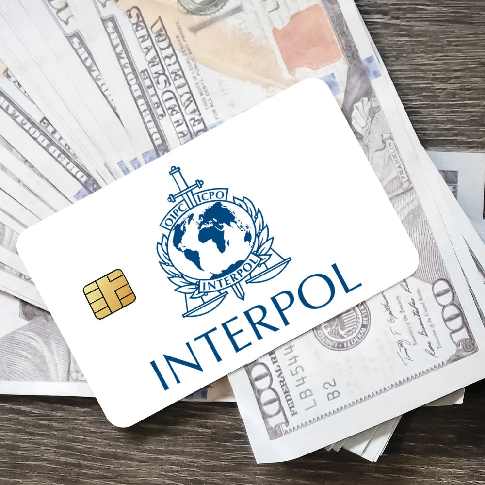 stylo bille bleu interpol logo globe épée carte bancaire