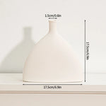 vases blancs modernes céramique rondes lignes horizontales décoration intérieure simple