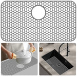 tapis protection évier silicone gris moderne antidérapant nid d'abeille hexagonal central respectueux environnement cuisine