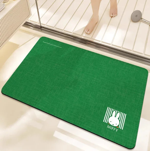 tapis bain dessin animé lapins gris jaune vert bleu rayures enfantin absorbant