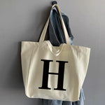 sac main femme toile beige clair lettre noire poignées détachables