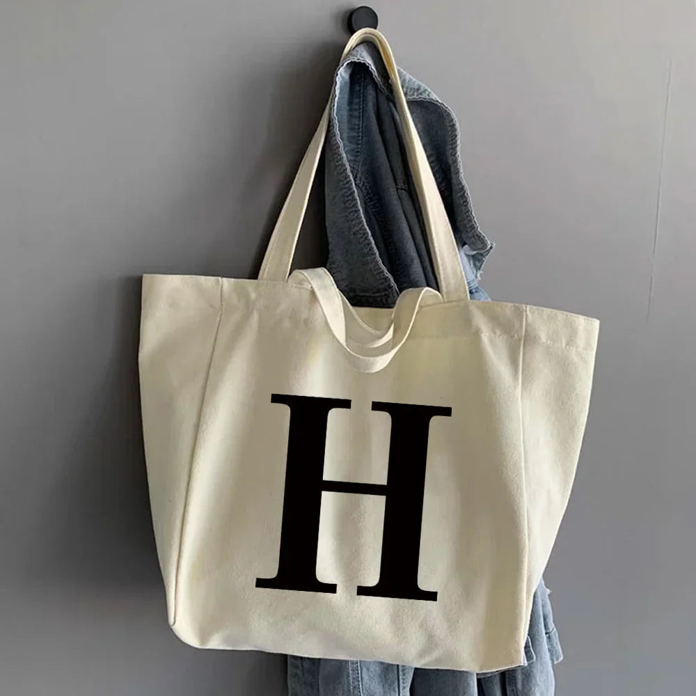 sac main femme toile beige clair lettre noire poignées détachables