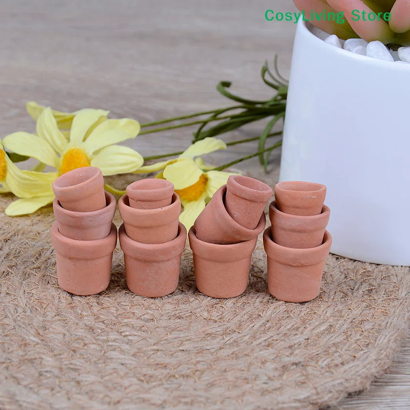 pots décoration miniature rustique terre cuite fleurs jaunes centre orange tapis fibres naturelles surface