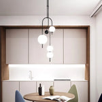 suspension lumineuse moderne sphères translucides structure métallique noir blanc