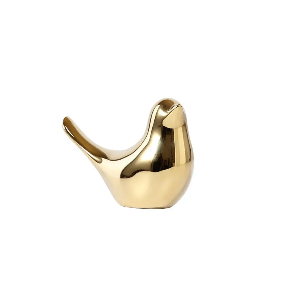 décoration intérieure moderne oiseau céramique doré lisse brillant grande taille minimaliste