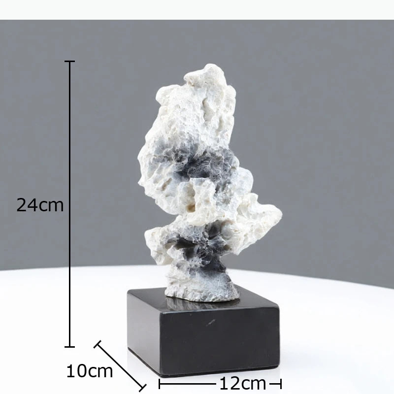 sculpture moderne décoration blanc noir gris rocheuse irrégulière zen livres diffuseur parfum bougie