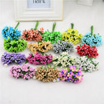 décoration intérieure bouquets artificiels fleurs boutons modernes variées feuilles vertes
