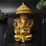 statue ganesha dorée résine ornements complexes décoration intérieure artisanale traditionnelle bouddhiste éléphant multiple bras