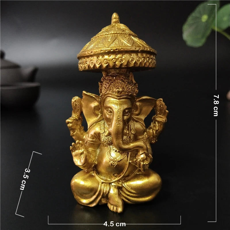 statue ganesha dorée résine ornements complexes décoration intérieure artisanale traditionnelle bouddhiste éléphant multiple bras