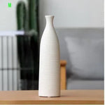 vases céramique modernes blanc noir orange texture tissée opaques salon
