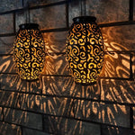 lanterne solaire suspendue noire spirales dorées extérieure artisanale ip44