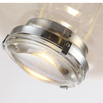 lampe suspendue moderne rose transparent fumé gris goutte forme allongée industriel fil apparent métal