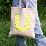 sac main toile beige imprimé floral jaune feuilles respectueux environnement poignées amovibles tridimensionnel multi