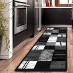 tapis moderne géométrique noir gris blanc salon entrée contemporain polyestère aubusson lavage machine