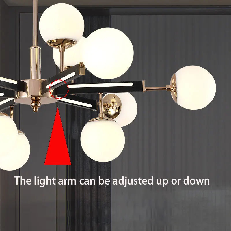suspension lumineuse moderne or noir blanc sphères translucides structure métallique fixée lumière led