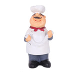 figurine cuisinier cartoon blanc gris rouge texture résinée brillante assiettes fruits spatule cuillère