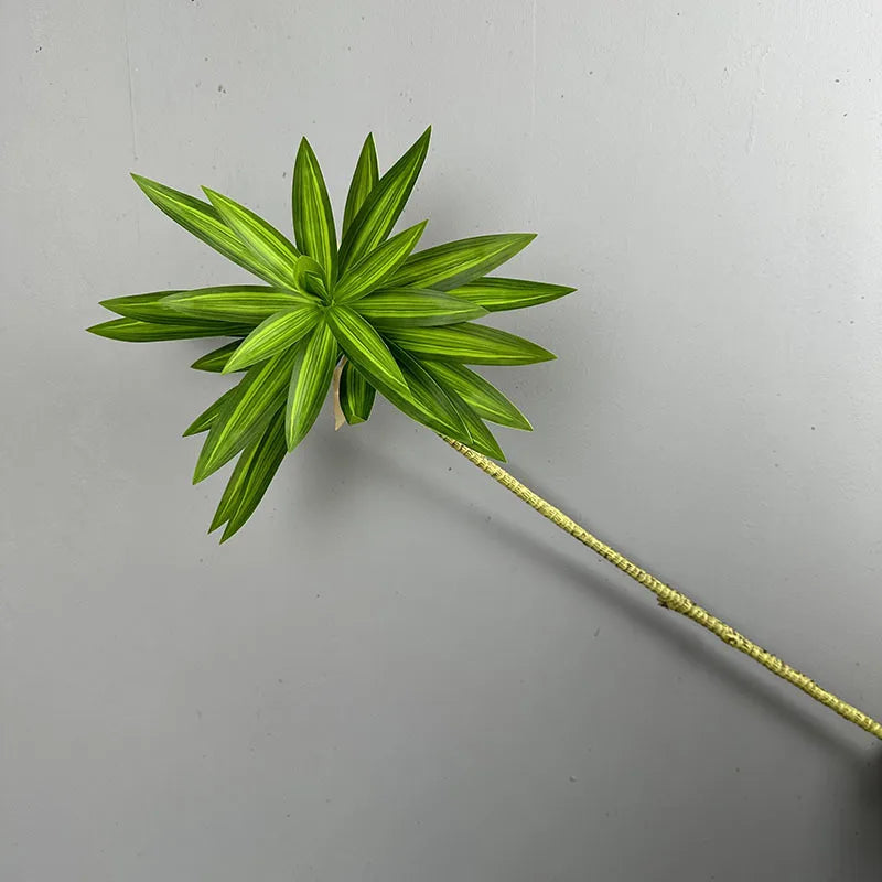 plantes artificielles décoration intérieure moderne feuilles vertes tiges grises maison vert clair blanc minimaliste