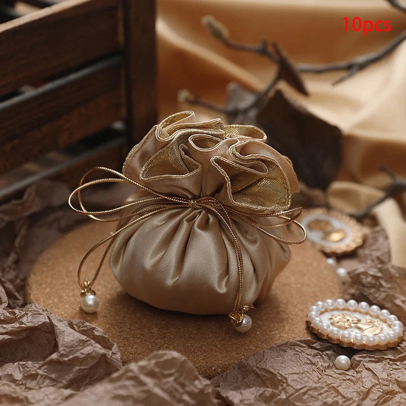 sac cadeau violet satiné ruban doré blanche élégant anniversaire bijoux cadeau opulent 10 pièces