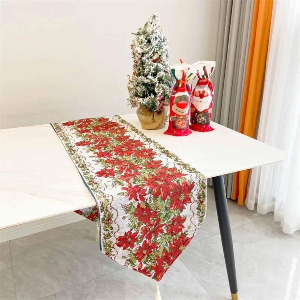 table table noël fleurs poinsettia feuilles vertes bordure dorée classique festif blanc rouge vert