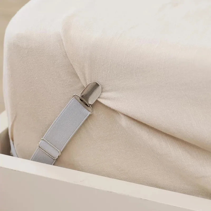 clips draps lit réglables antidérapants attaches matelas blanc gris rose pâle minimaliste utilitaire