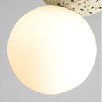 suspension lumineuse moderne ampoules led blanc noir rose gris texture granulée câble suspendu minimaliste