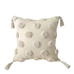 taies d'oreiller géométriques brodées boho chic couleurs beige orange gris franges respectueuses environnement decoration