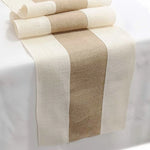 nappe tissée rustique beige marron bandes horizontales fleurs vase blanc couverts argentés chaises croisées