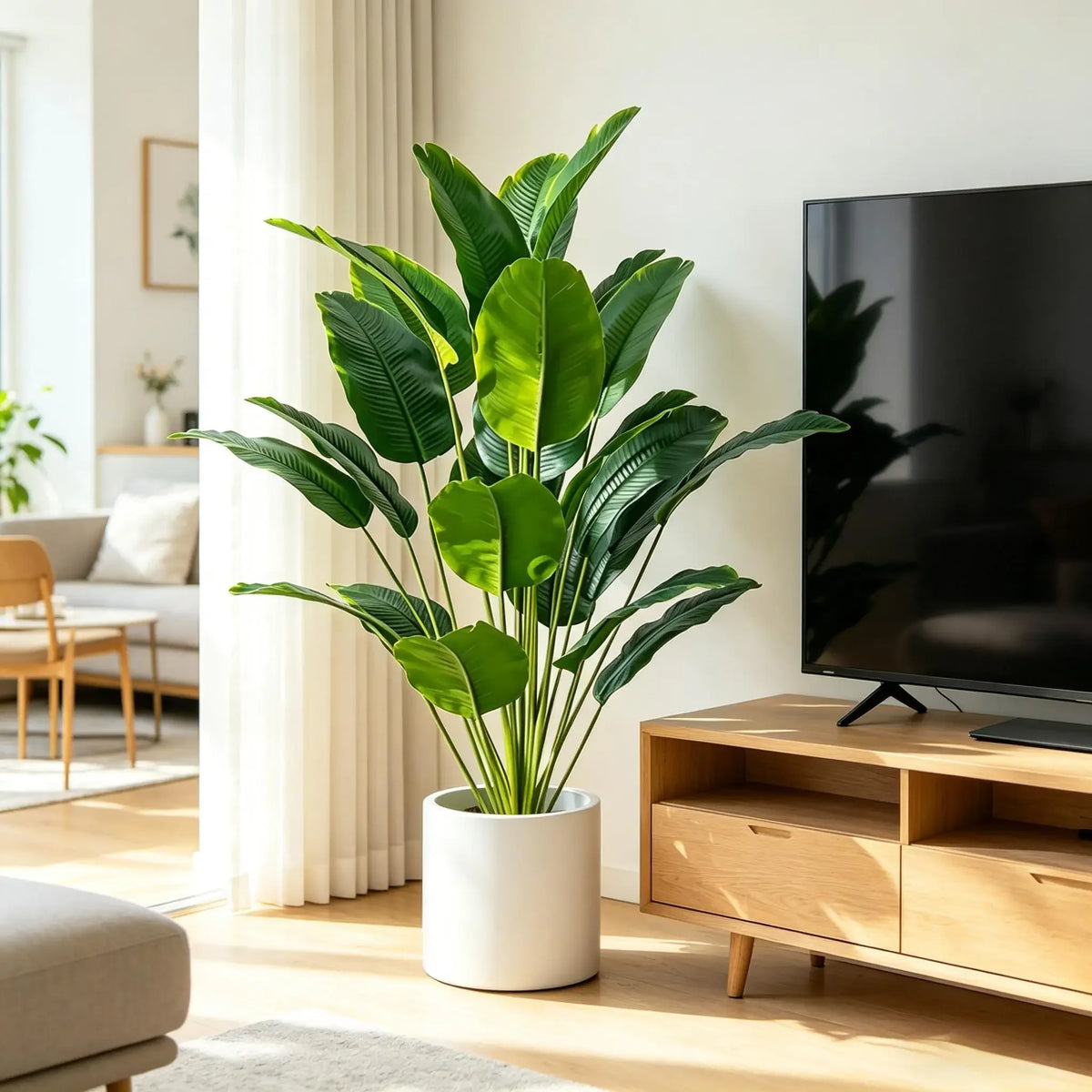 plantes artificielles feuilles larges arbres vert modernes decoration maison pots blancs grandes dimensionsintérieur